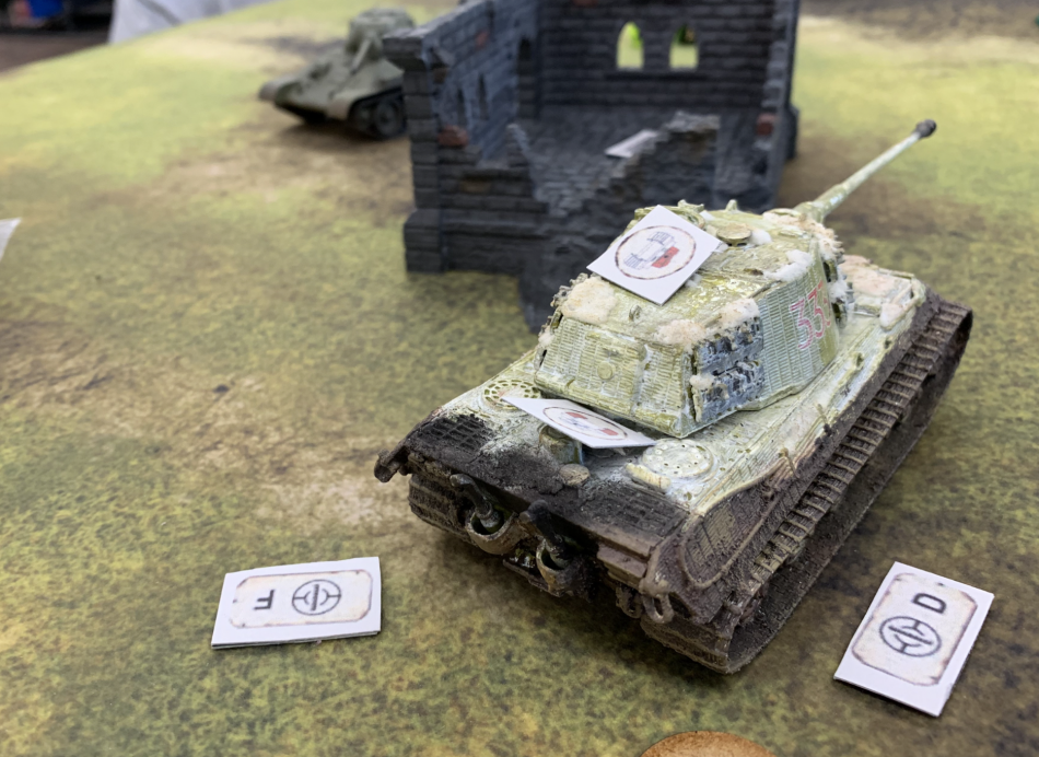A T-34 sneaks up on the King Tiger